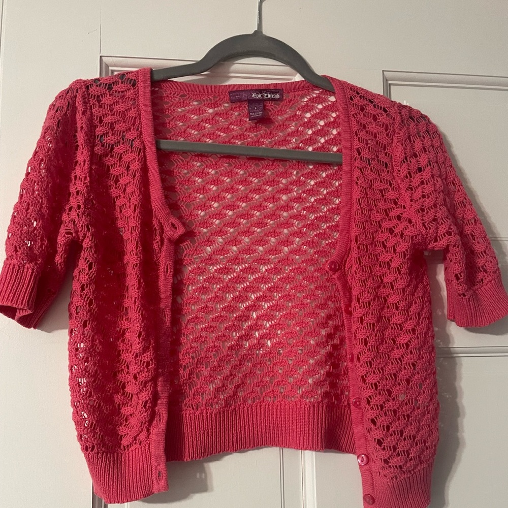 Hot pink kids jacket also fits as juniors